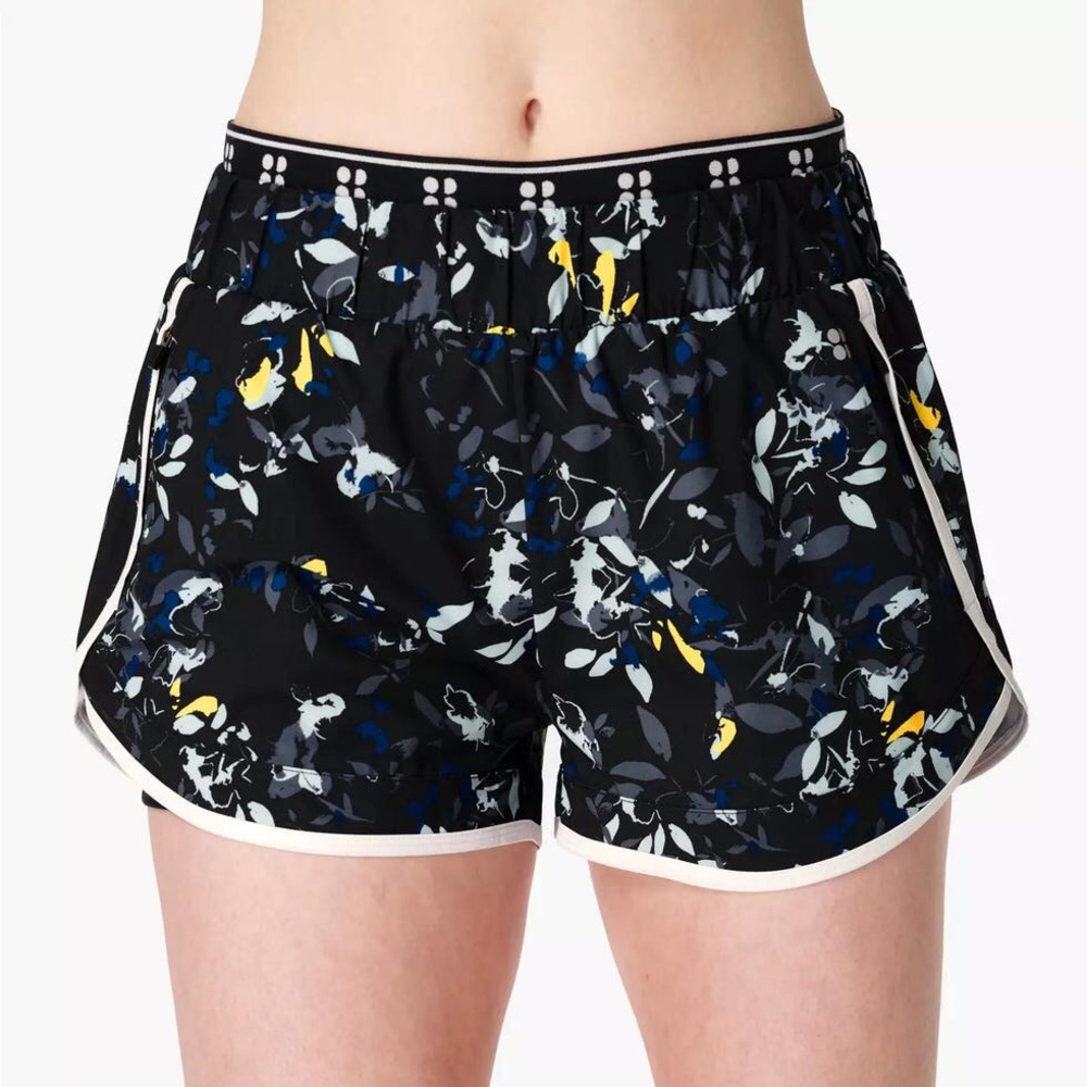 Sweaty Betty On Your Marks 4" running shorts blue and black floral print Size S